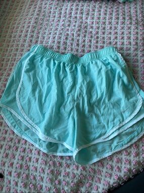 Nike Women’s Aqua Blue Athletic Shorts with White Trim